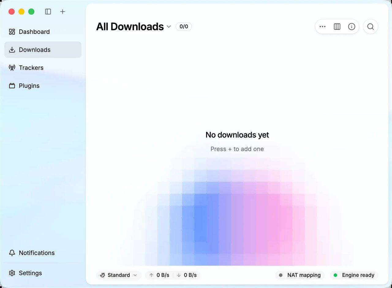 Downloads view — completed, active and paused tasks Motrix Next downloads view listing completed, active and paused tasks with per-task speed and progress.